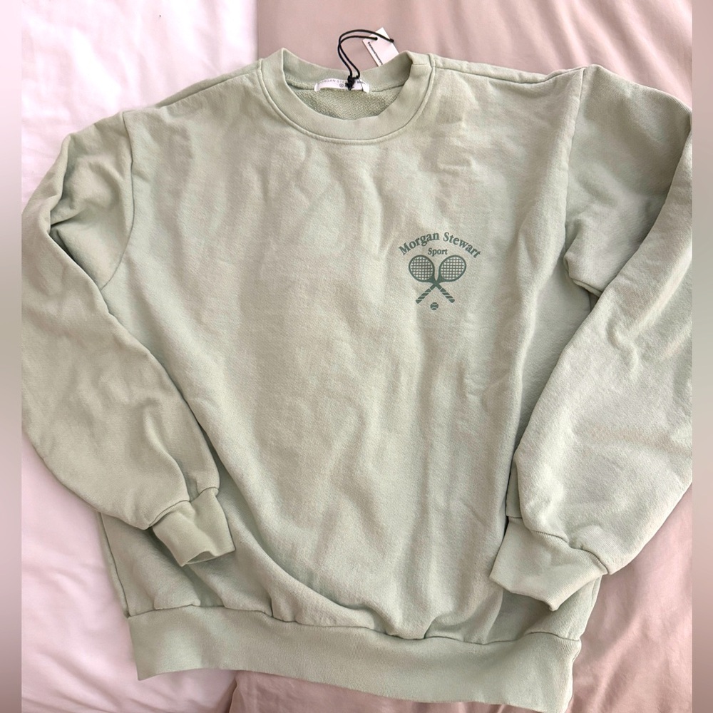 Morgan Stewart Tennis Sweatshirt
Brand New
Size Small